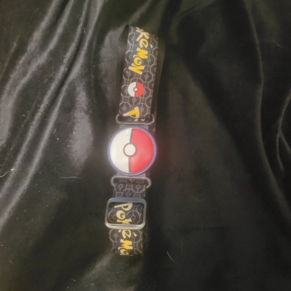 Red and Black Watch with Intricate Bead Design